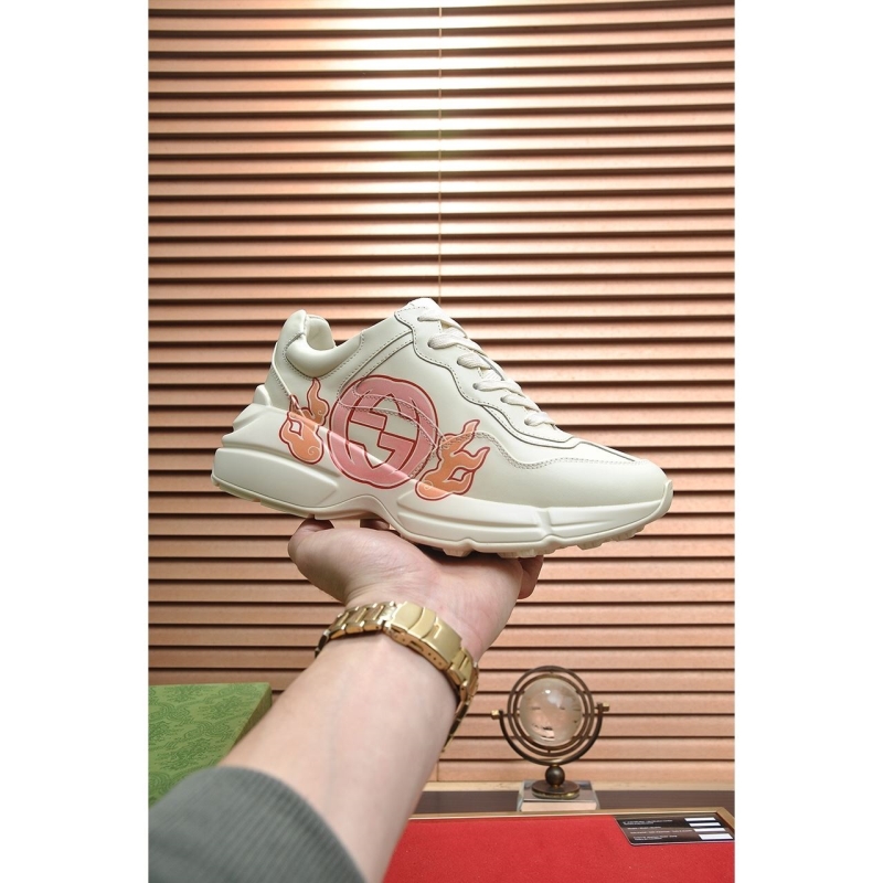 G*u*i sneakers